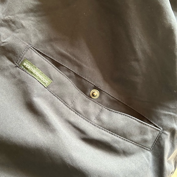 WP100 Men’s black golf jacket. Snap pockets weatherproof - Picture 4 of 5